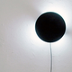 Illustration for article titled Put a Time-Telling Solar Eclipse On Your Wall